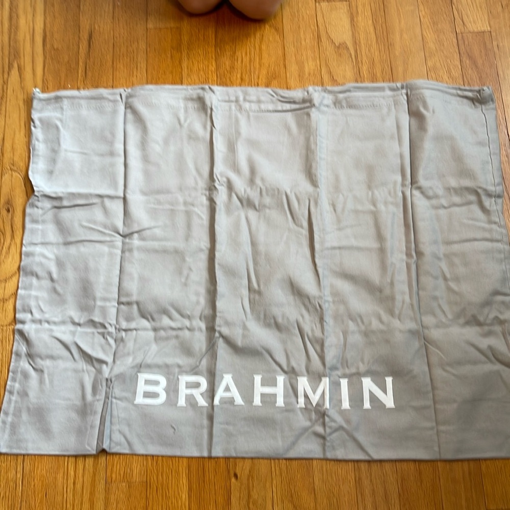 Brahmin dust bag. 30”x23”. Gray with white writing. Drawstring. Brand new